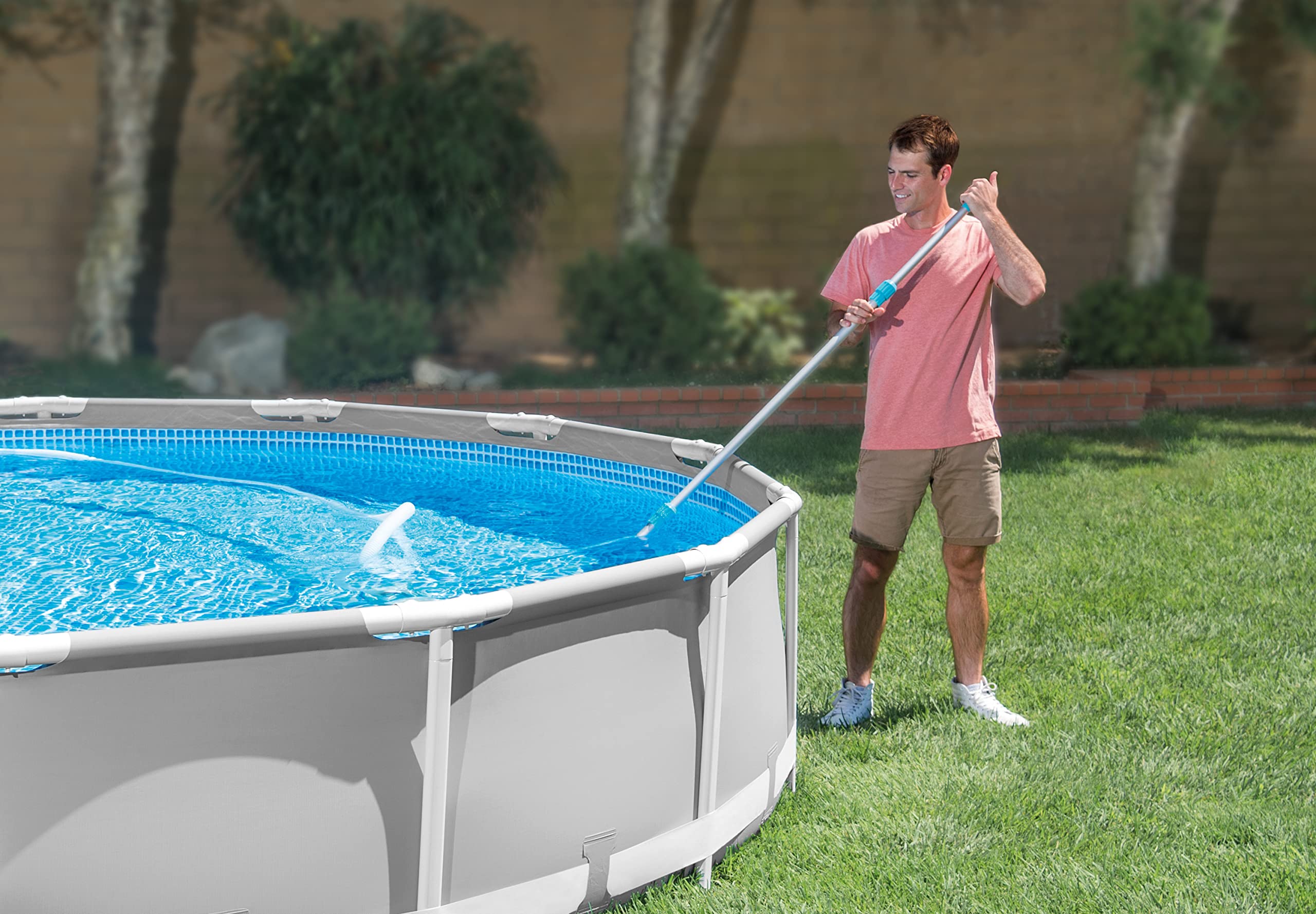 Intex vacuum head on pool floor showing suction contact for cleaner bottom