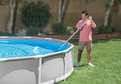Intex vacuum head on pool floor showing suction contact for cleaner bottom
