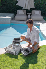 INTEX ZX500R cleaning inside a backyard pool illustrating cordless freedom