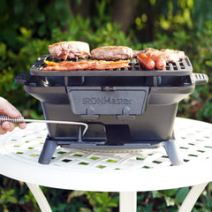 IronMaster hibachi side coal door open for easy charcoal refilling without removing the grate