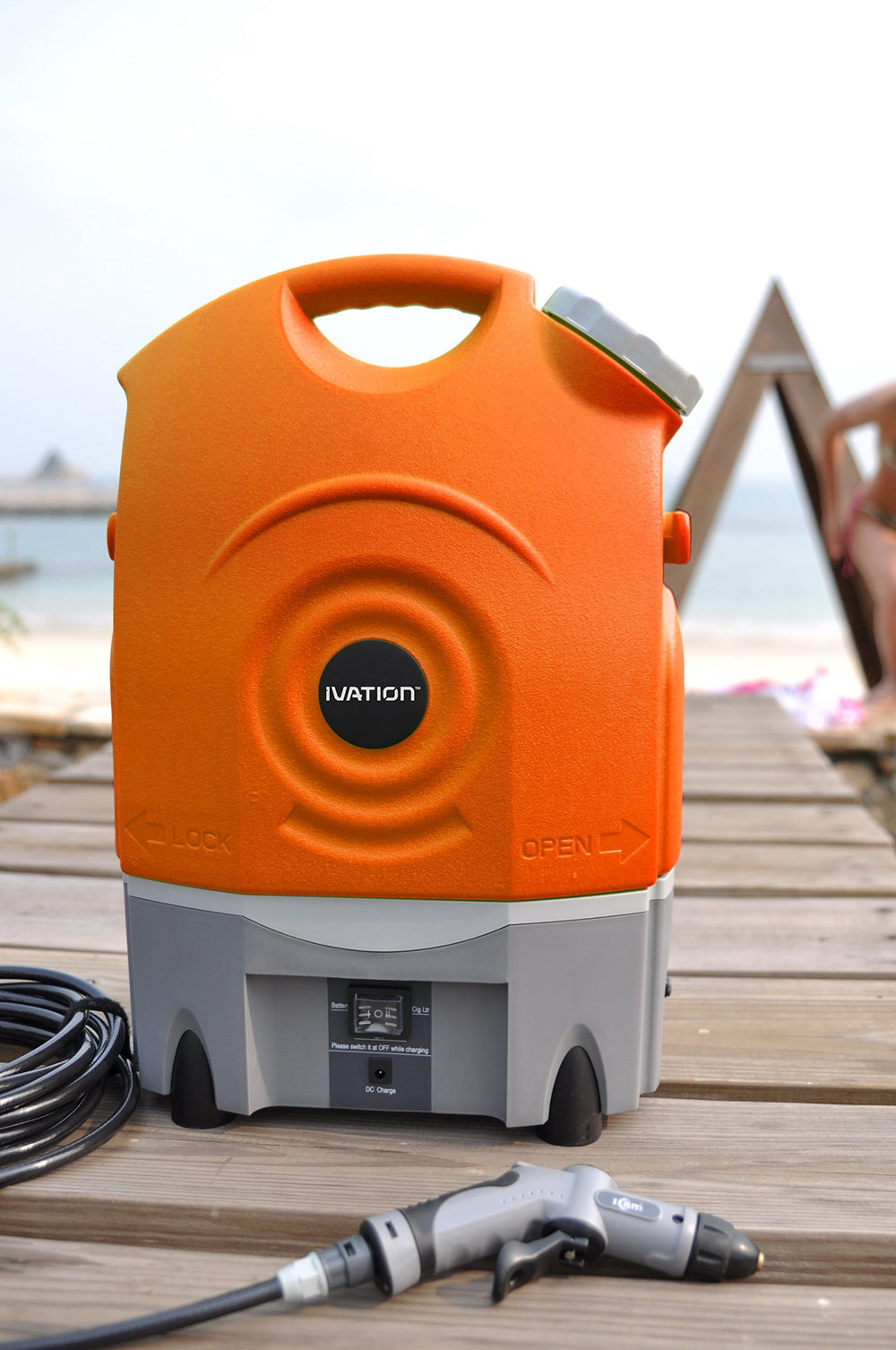 Ivation being used at a campsite to rinse gear and pets outdoors