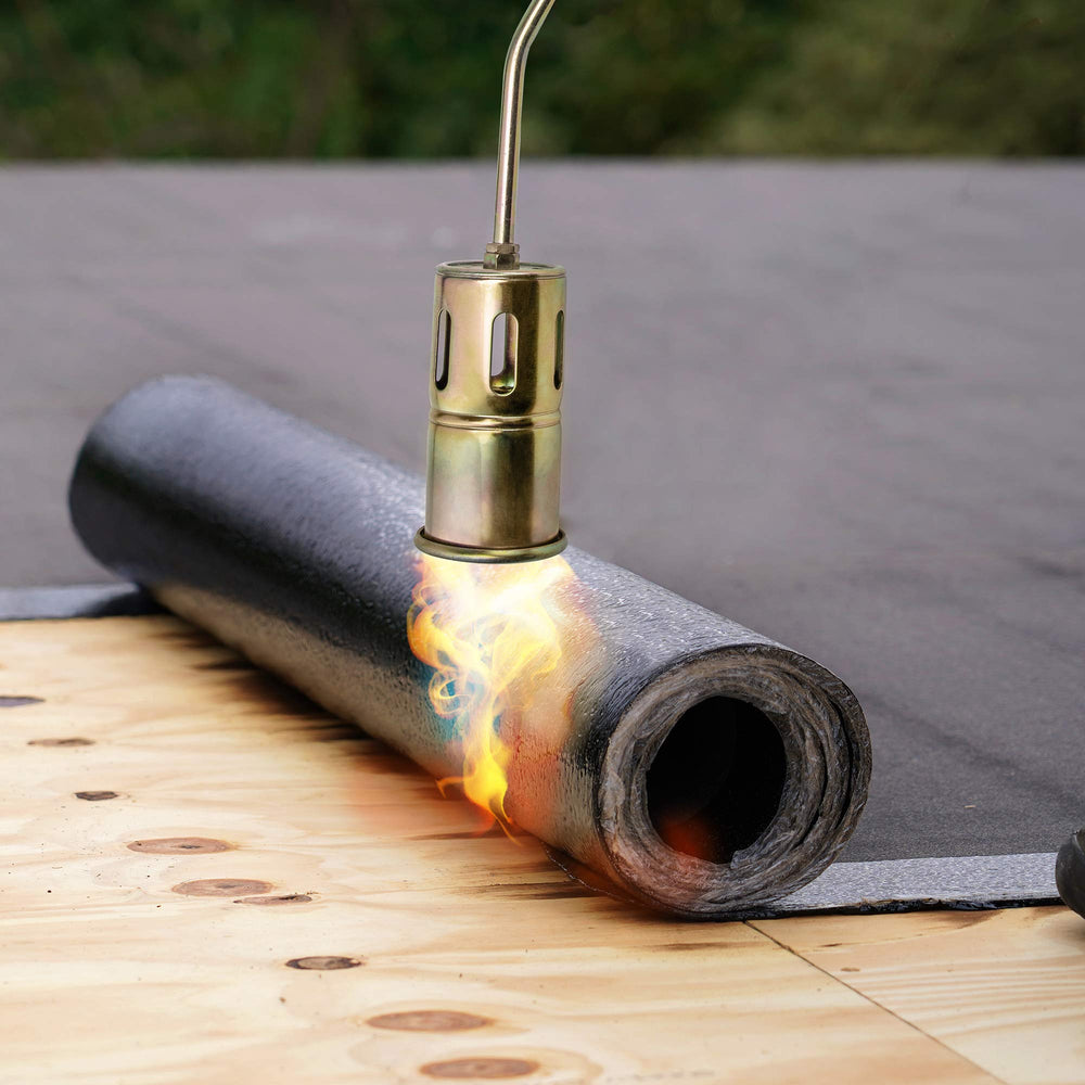 Ivation torch next to propane cylinder showing scale and portability