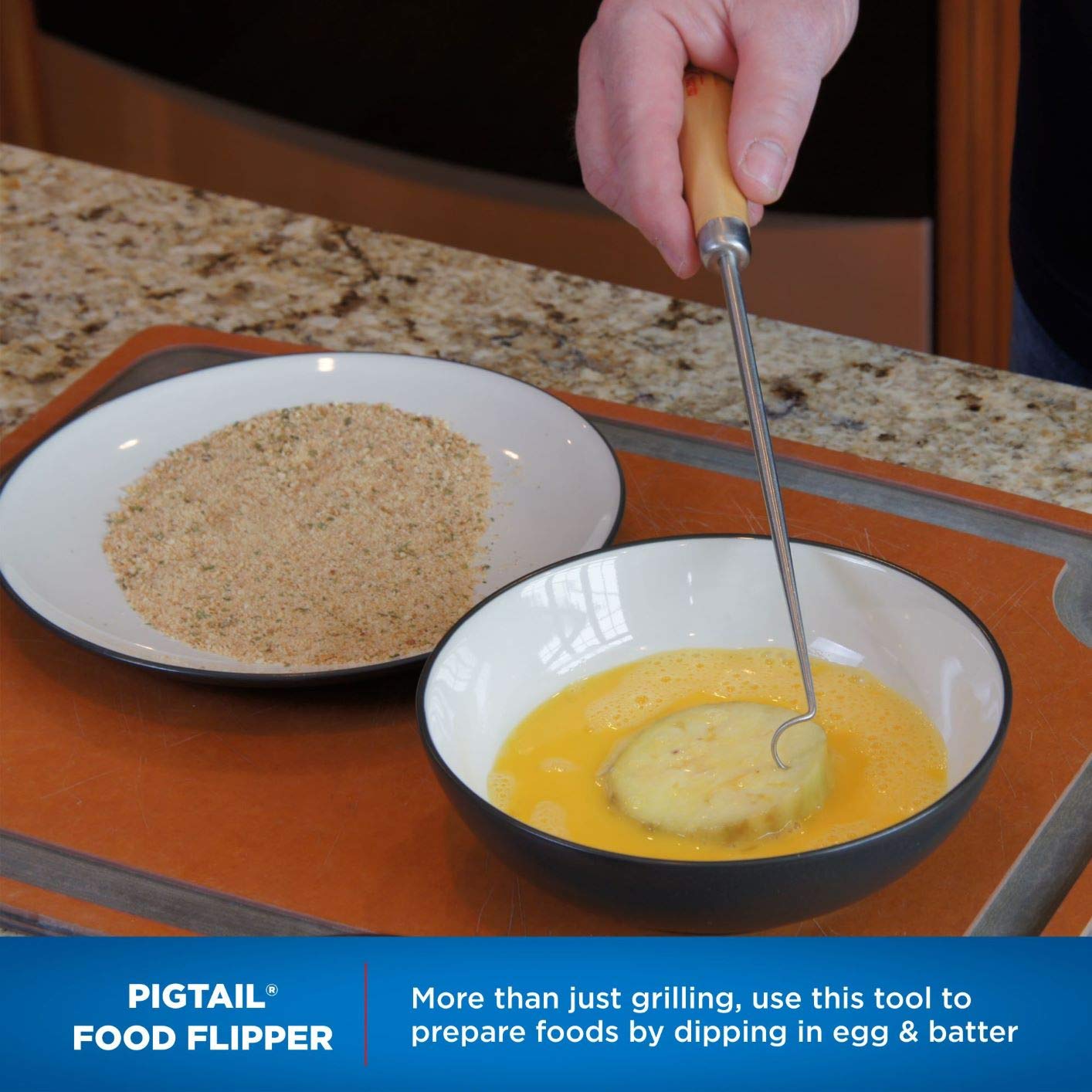 Jaccard PigTail flipping steak on a grill for controlled, single‑handed turning