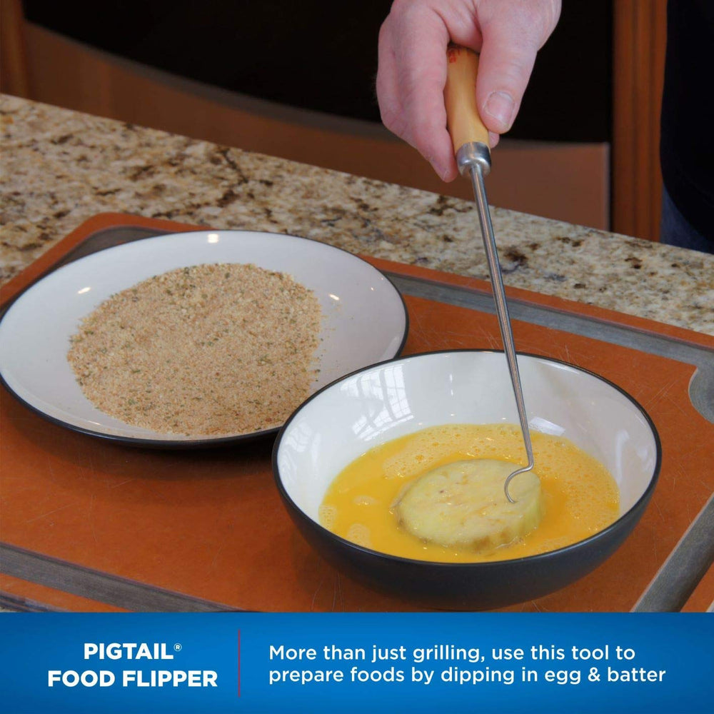 Jaccard PigTail flipping steak on a grill for controlled, single‑handed turning