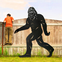 JAMZEL Bigfoot next to person for scale showing life-size visual impact benefit