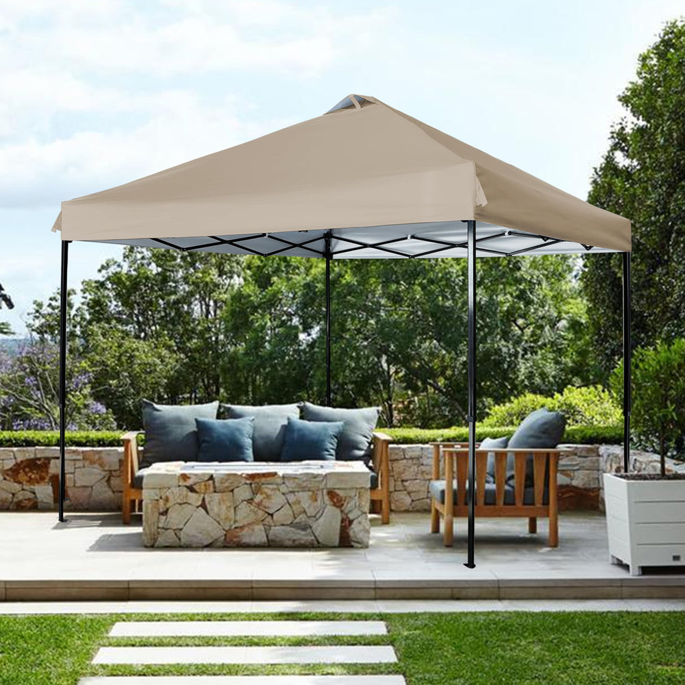 JANCANOPY khaki canopy in backyard setting showing shaded seating and cooler space