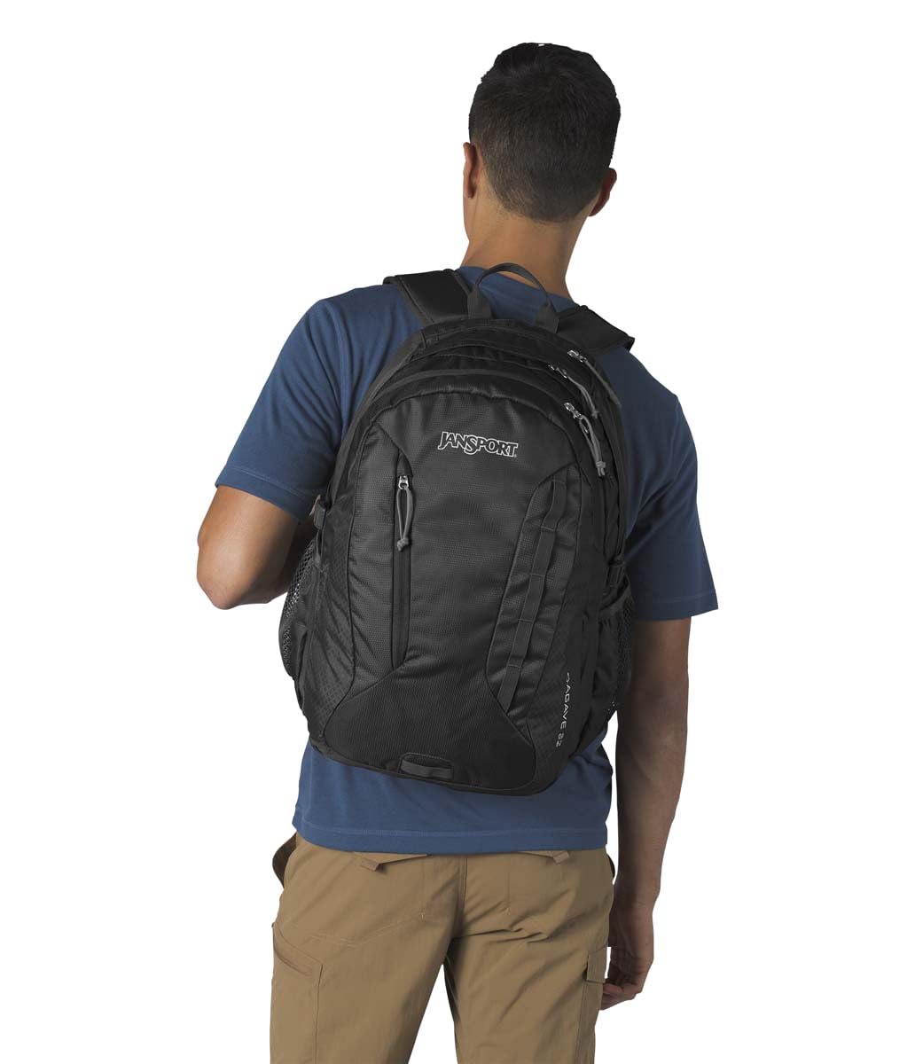 JanSport Agave worn by commuter illustrating comfort of AirCore straps and laptop protection