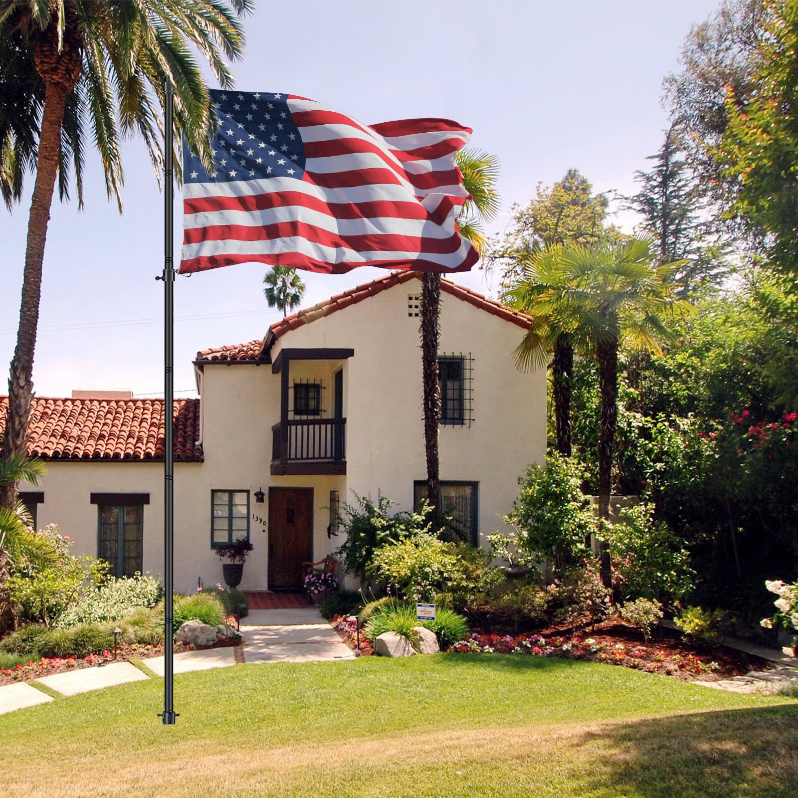 JAOTREL flagpole installed in yard showing clear display and wind stability
