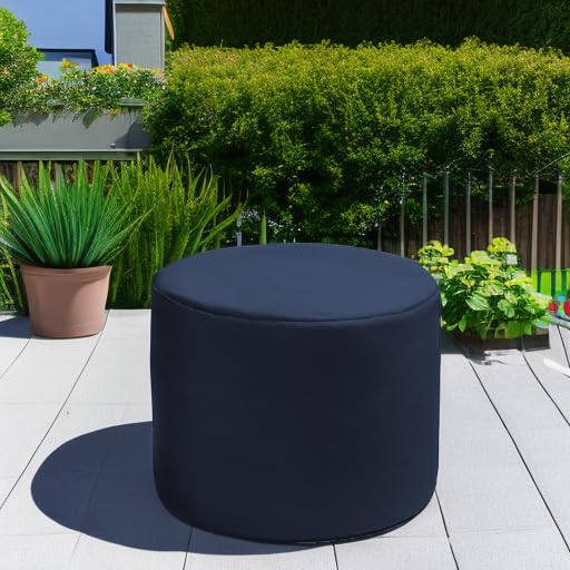 Jaxx navy pouf in living room use next to sofa offering extra seat and visual complement