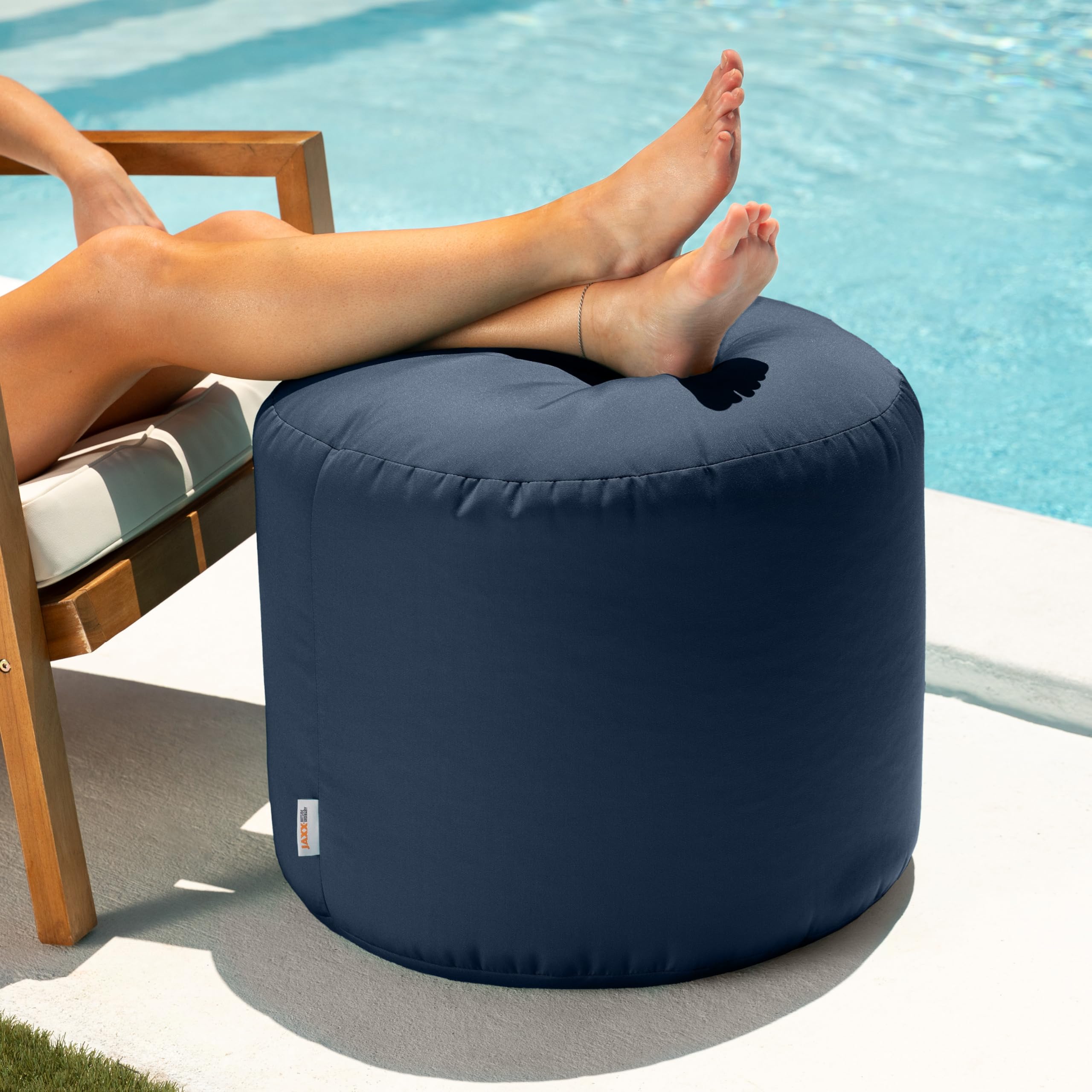 Jaxx navy pouf side profile highlighting height and shape, ideal for footrest support
