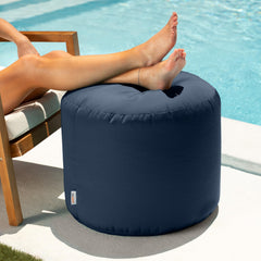 Jaxx navy pouf side profile highlighting height and shape, ideal for footrest support