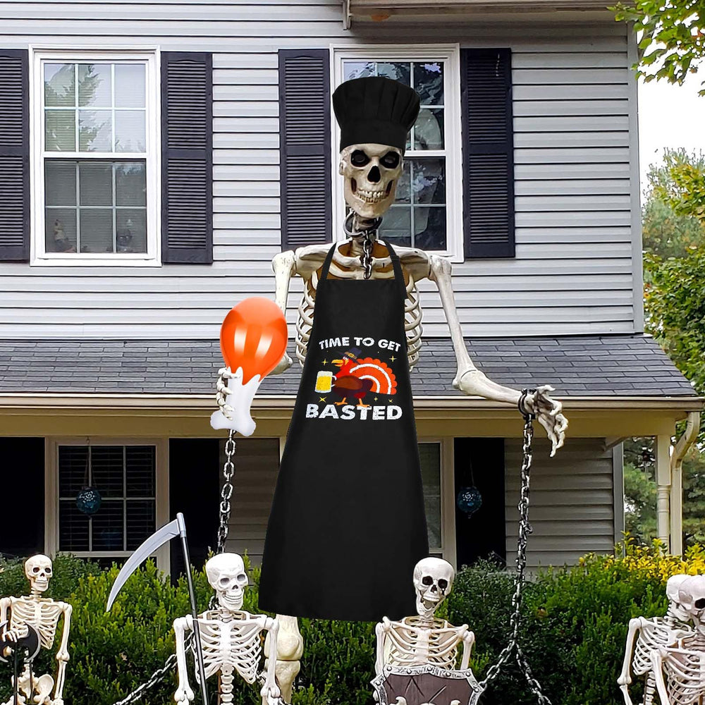 JcHrmers full skeleton display wearing apron and hat with inflatables, eye-catching yard decor