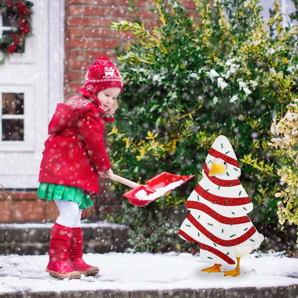 JcHrmers porch scene with dressed goose enhances curb appeal