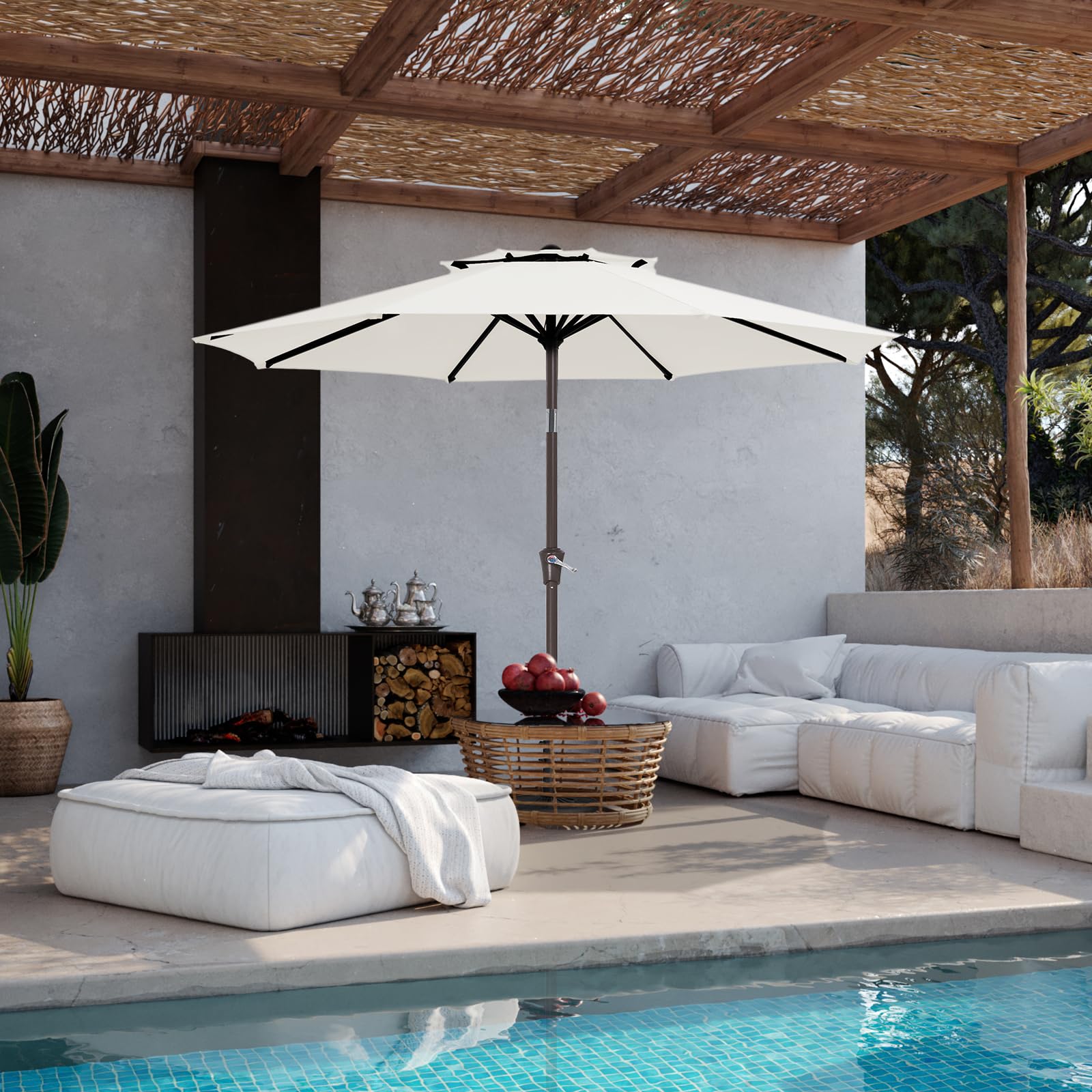 JEAREY umbrella installed over patio table showing scale and covered seating
