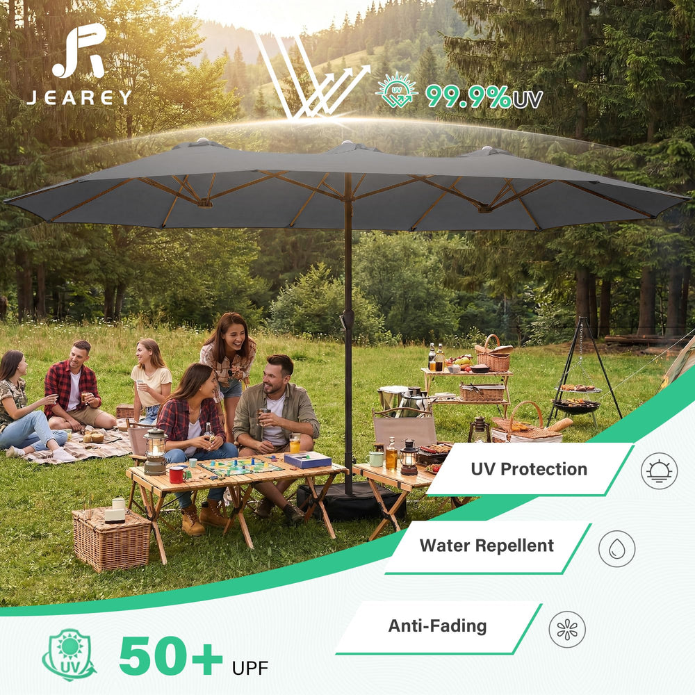 JEAREY umbrella beside patio furniture illustrating scale and usable shaded area benefit