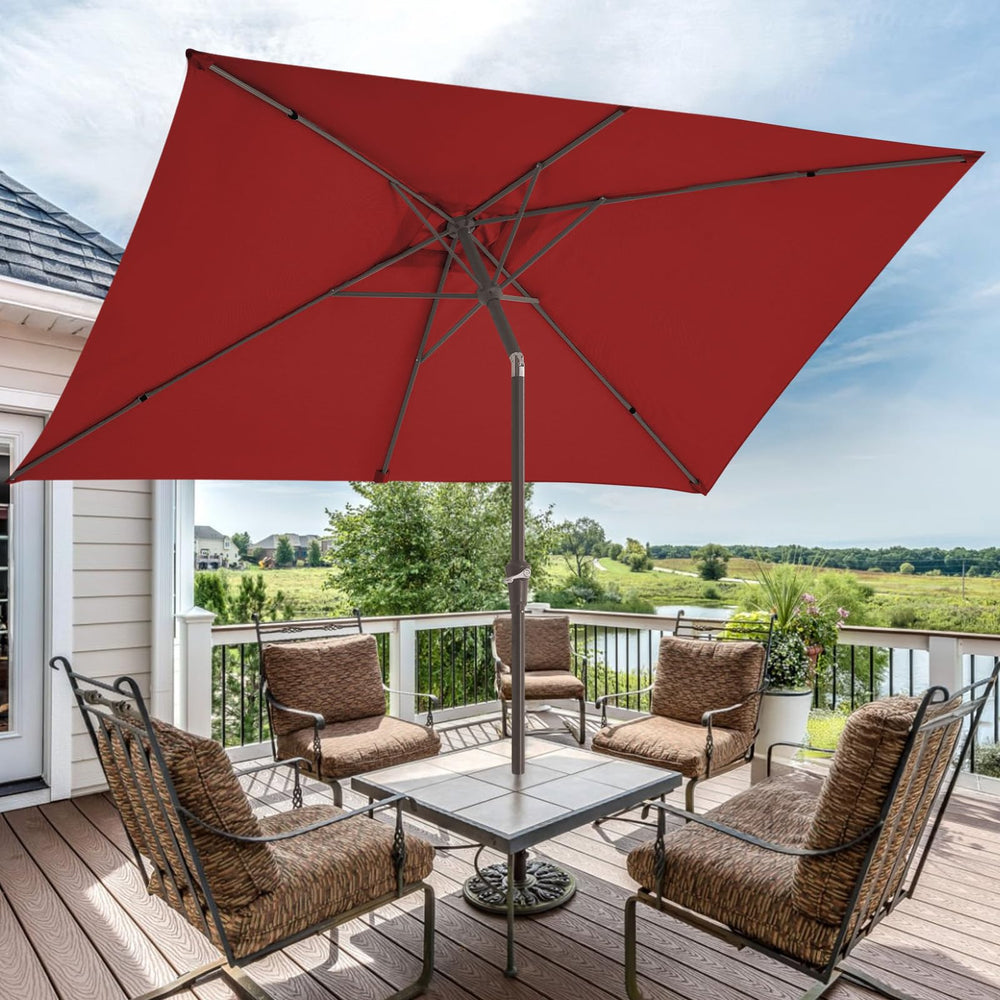 JEAREY umbrella shading a dining table offering comfortable seating