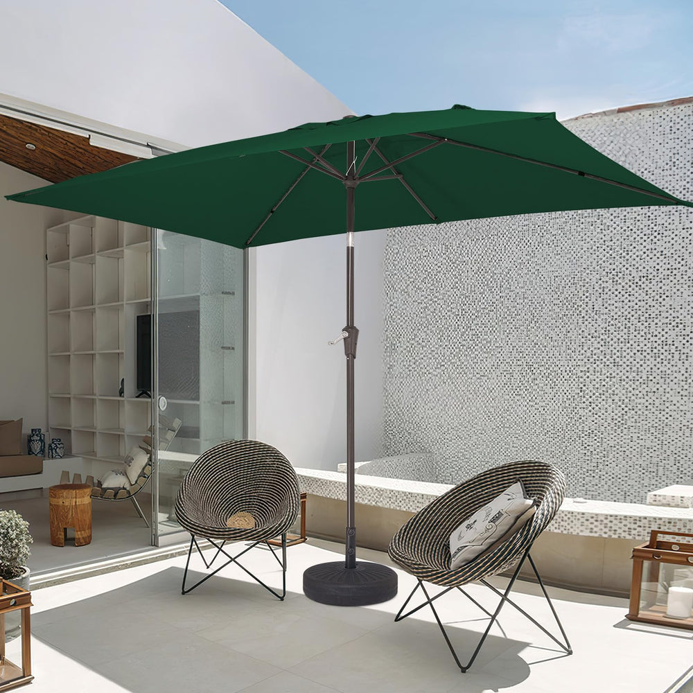 JEAREY umbrella beside chairs showing coverage and scale