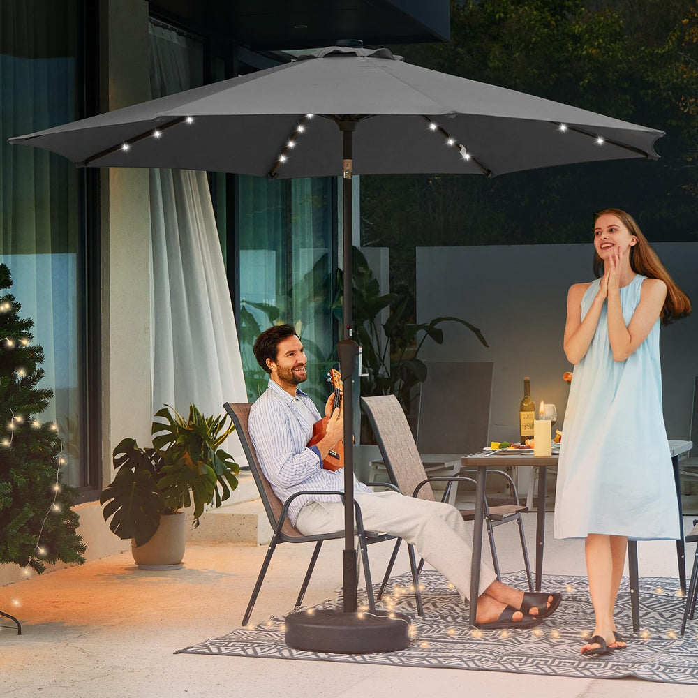 JEAREY umbrella beside dining table showing 9' coverage and seating fit benefit