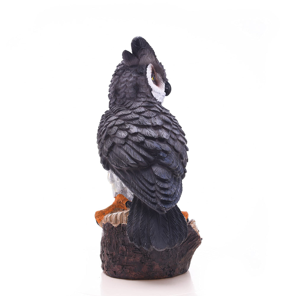 Jeelyfu owl next to ruler for size comparison showing 10-inch compact versatility