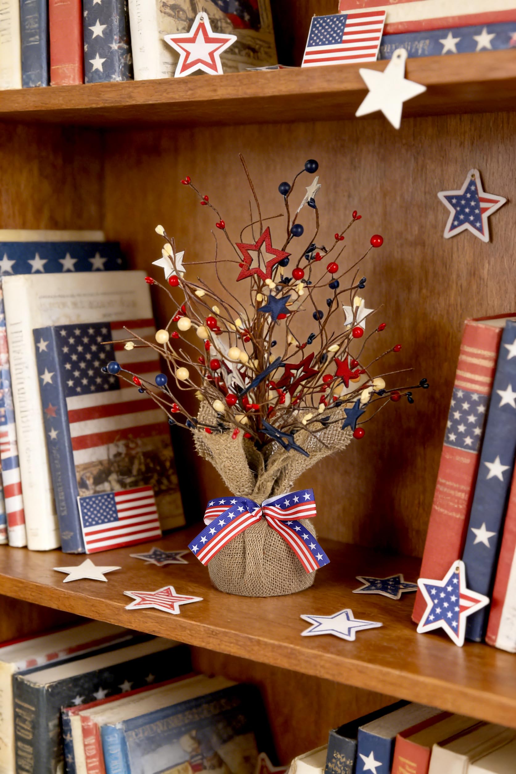 JEGERMIG tabletop tree on a mantel adding compact patriotic ambiance and easy placement