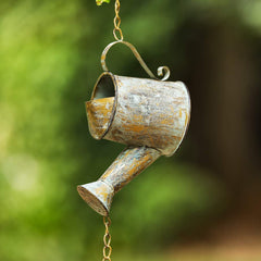 Jemeni watering can detail showing vintage silhouette and decorative charm