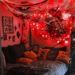 Jetec red LED string lights lit across webbing creating eerie ambiance