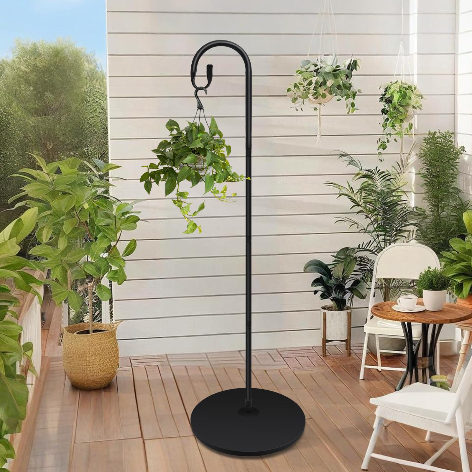 JETTIFY shepherds hook next to chair for scale showing full 63-inch height