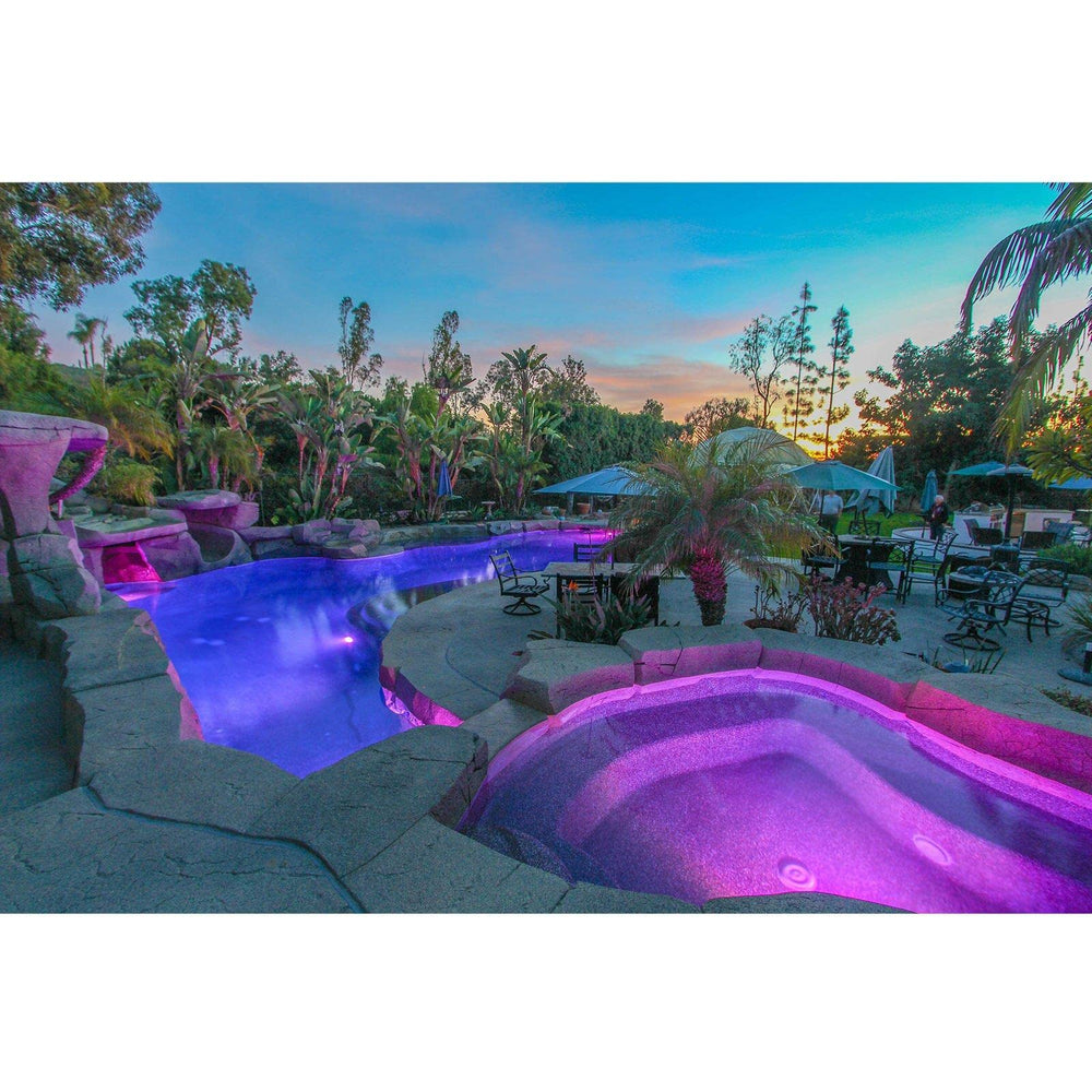 J&J Electronics lamp installed in pool showing colorful ambience and safety benefit