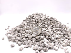 JK Global Imports pumice close-up granules showing 1/4 inch texture and improved drainage benefit