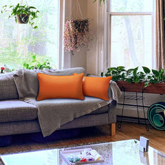 JMGBird lumbar pillow placed on patio chair offering comfortable back support outdoors