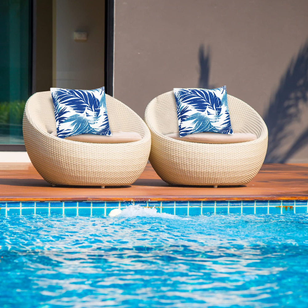 JMGBird pillows on patio furniture adding style and weatherproof benefit