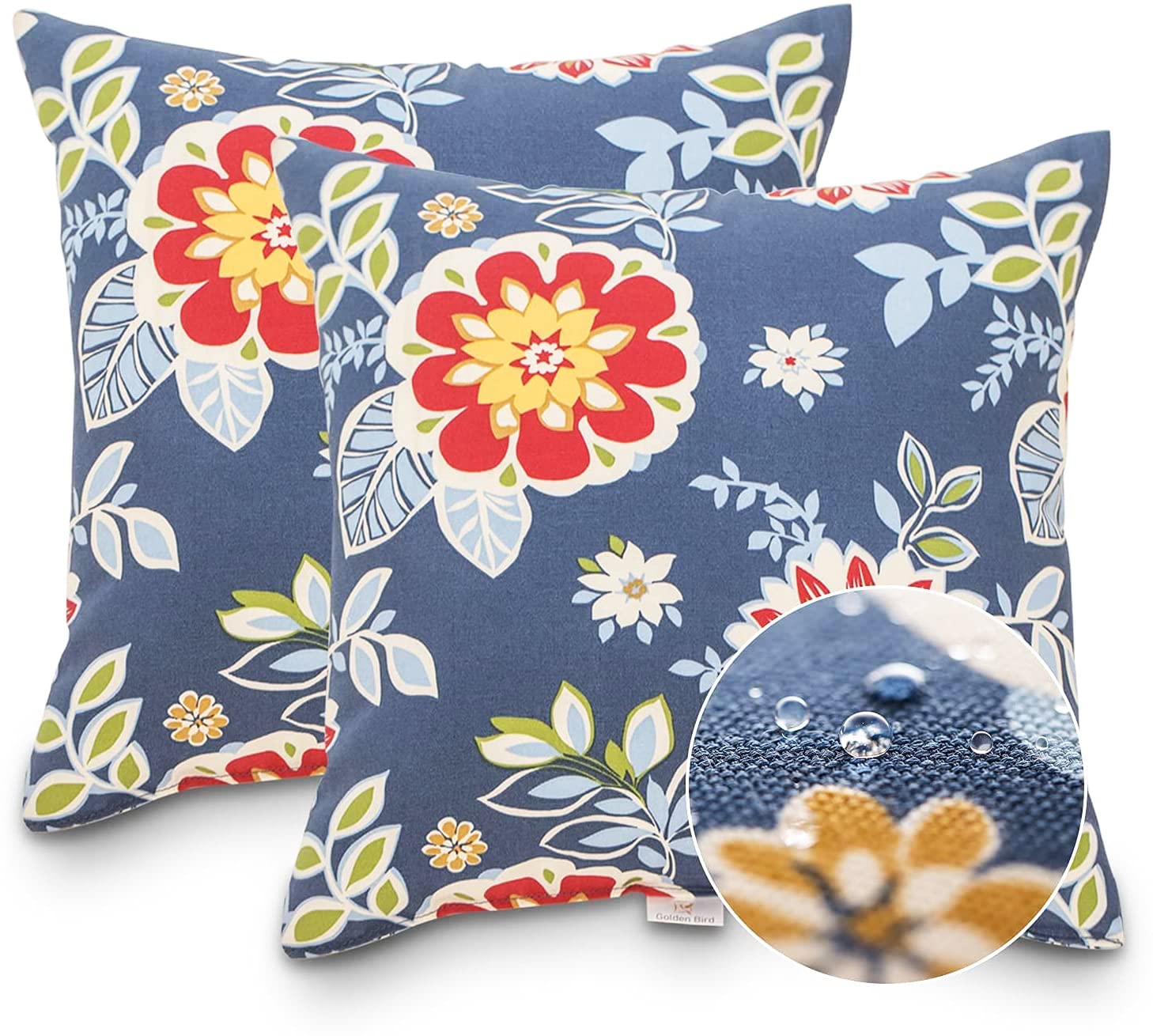 JMGBird pillows styled on a patio sectional adding botanical color and comfort