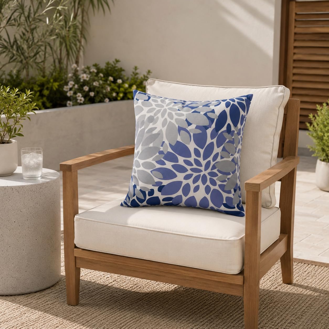 JMKaixin pillows on patio table setting illustrating versatile decor enhancement