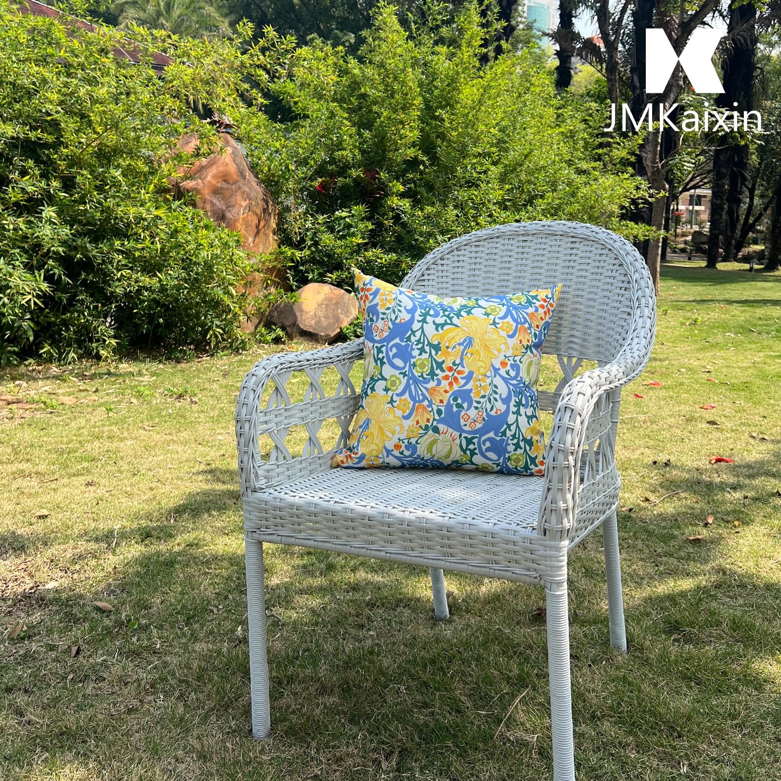 JMKaixin pillow on beach blanket showing portable comfort for travel and outdoor relaxation