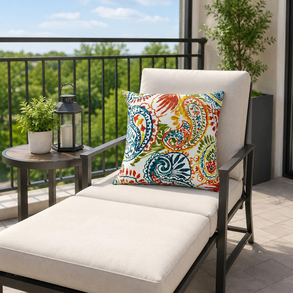 JMKaixin pillow styled on patio chair showing outdoor-ready decorative appeal