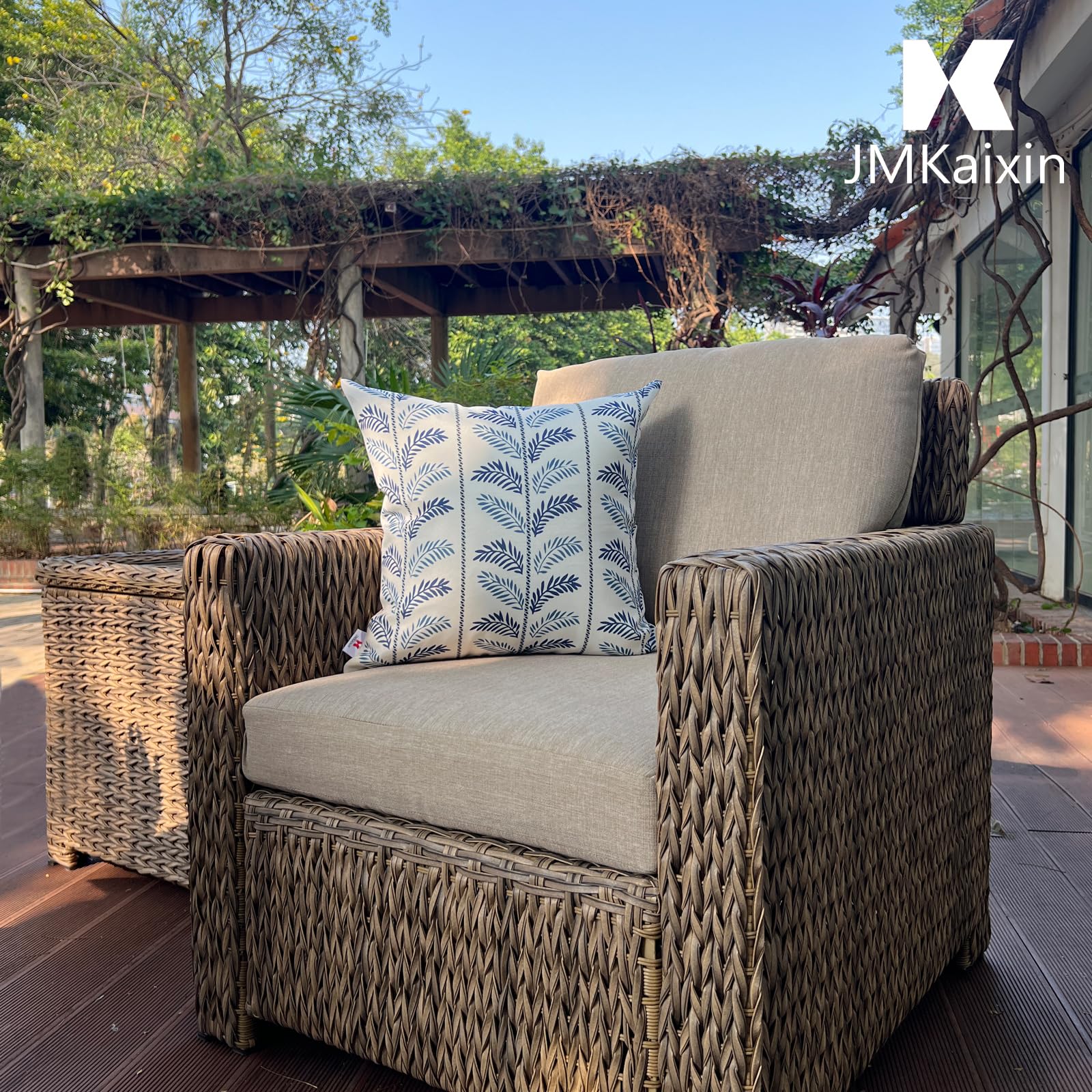 JMKaixin pillow placed on a patio chair, adds weatherproof decorative comfort