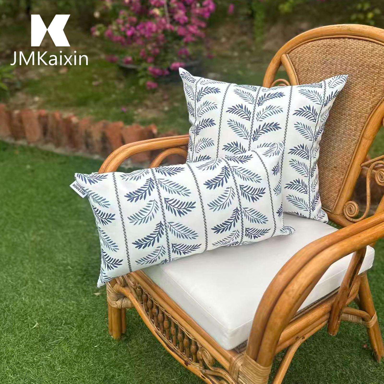 JMKaixin pillow next to hand for scale showcasing true 12x20 size