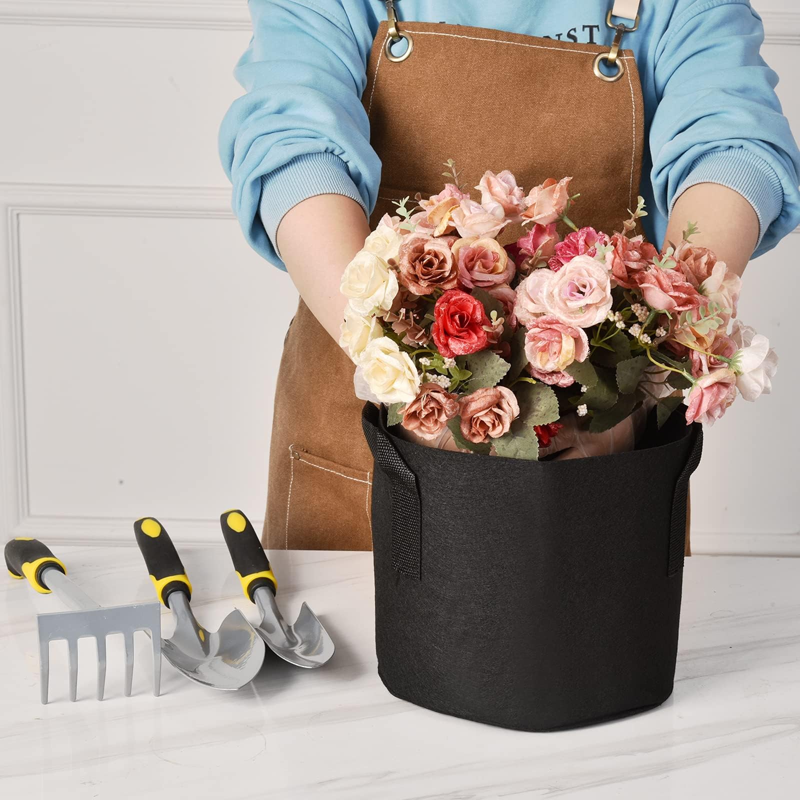 JNYONG size comparison beside a standard pot showing compact space-saving benefit