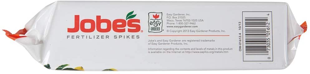 Jobe's Organics spike placement near tree drip line for efficient nutrient uptake