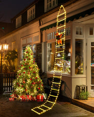 Joedoes front view of ladder lights showing tall festive glow and curb appeal