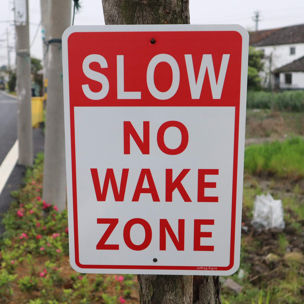 Joffreg sign on lakeside post creating a clear no-wake zone for residents