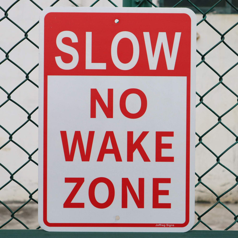Joffreg sign held in hand illustrating 17 by 12 inch size and easy mounting