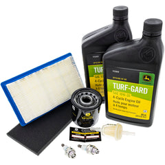John Deere LG256 oil and filters laid out for quick identification and convenience