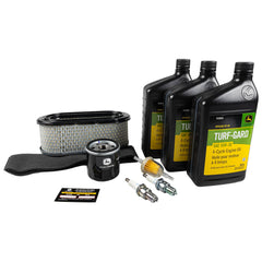 John Deere 10W-30 oil bottles clearly labeled for quick oil change use