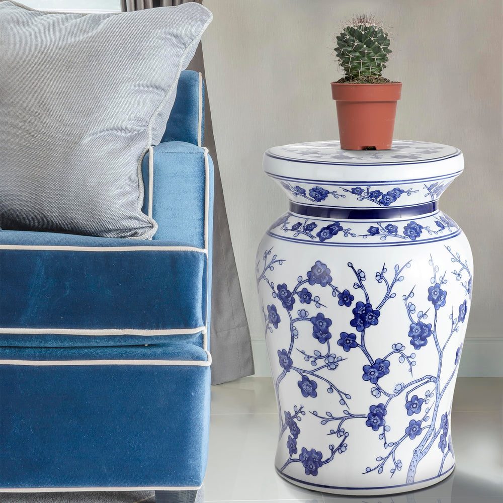 JONATHAN Y stool beside sofa used as side table for drinks and books