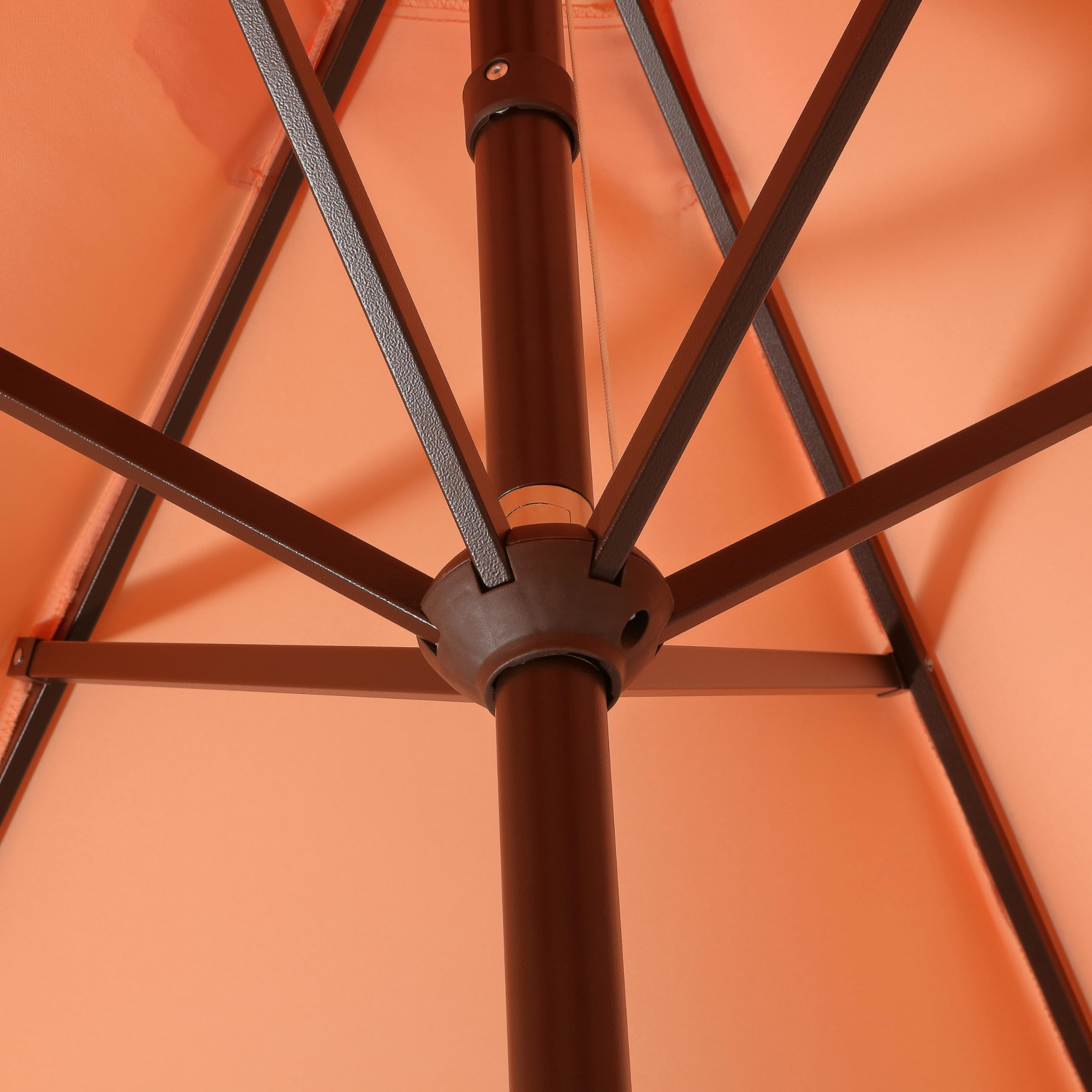 JONATHAN Y umbrella folded and stored demonstrating compact storage convenience