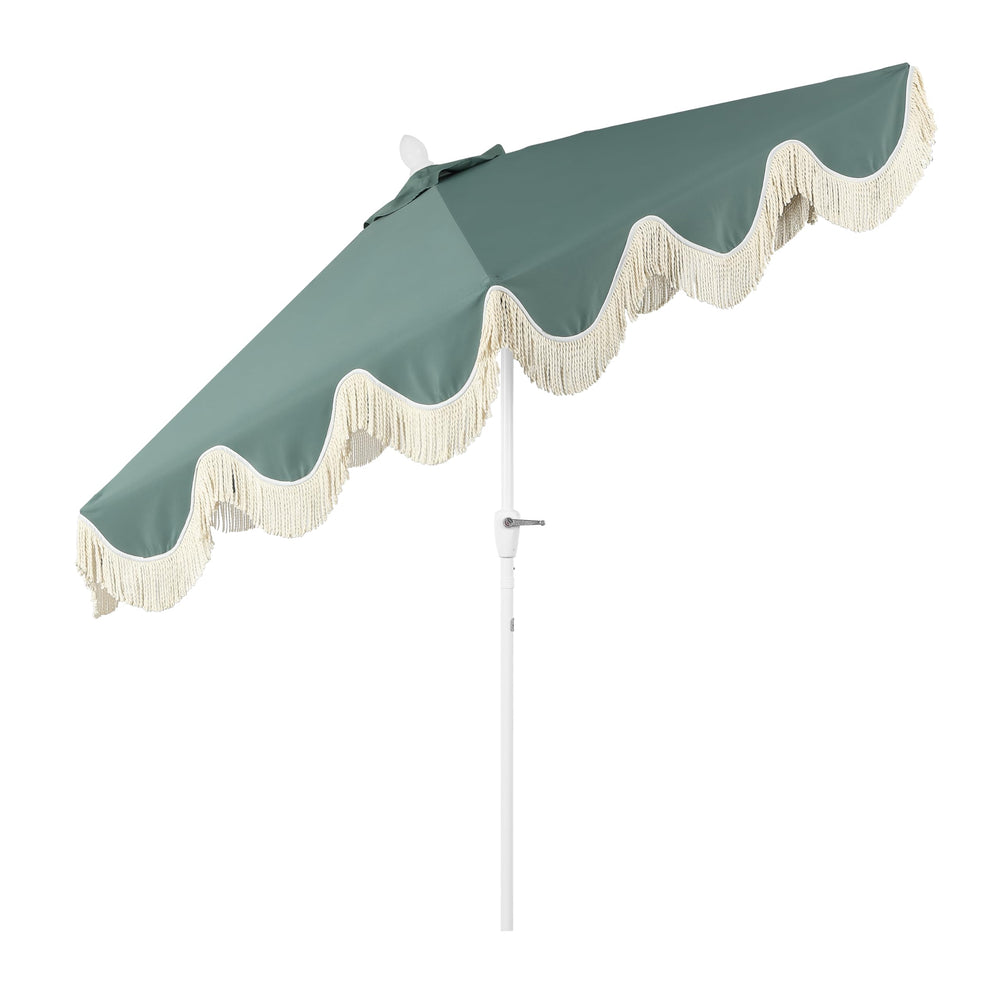 JONATHAN Y umbrella shading patio dining set creating comfortable outdoor space