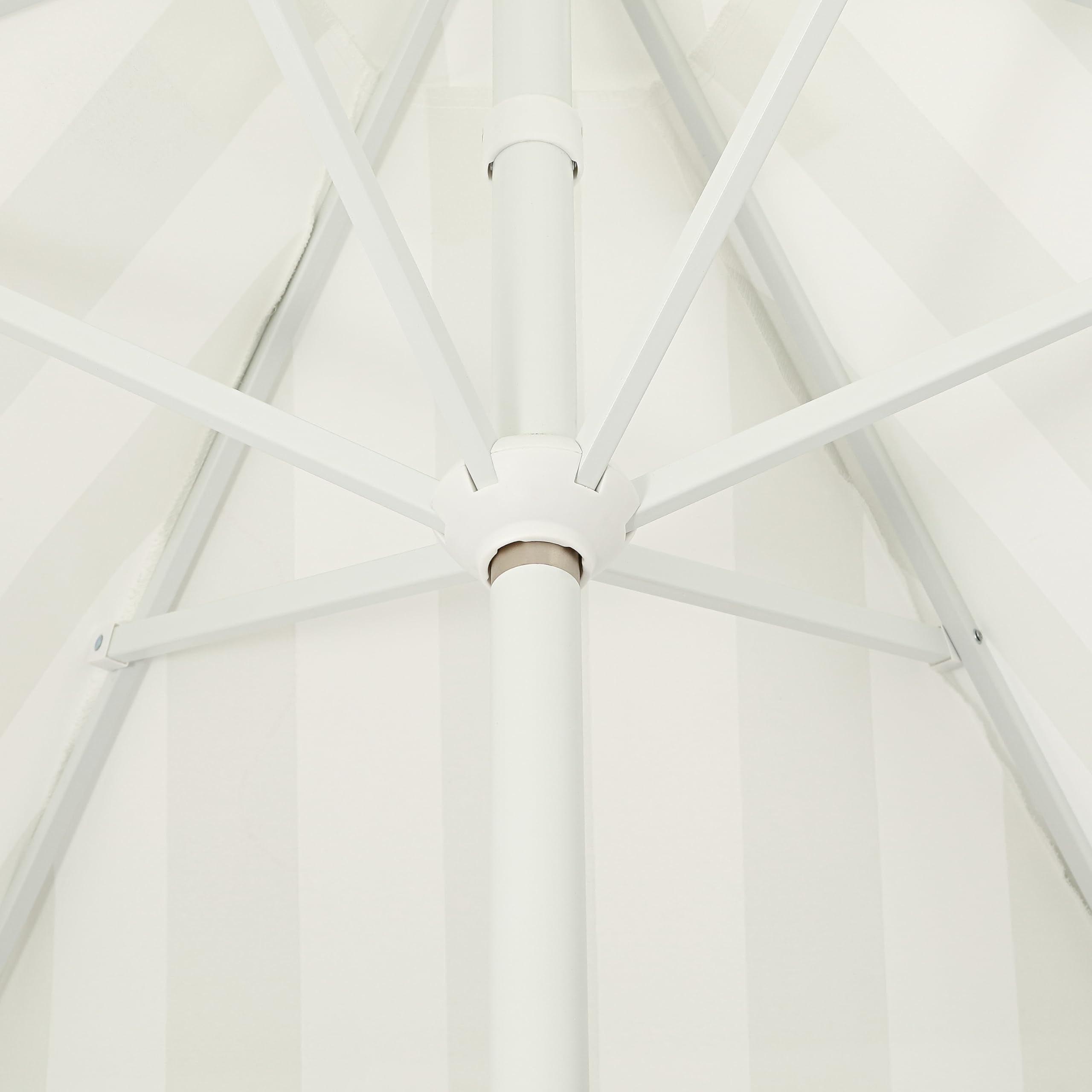 JONATHAN Y folded umbrella with packaging showing storage convenience