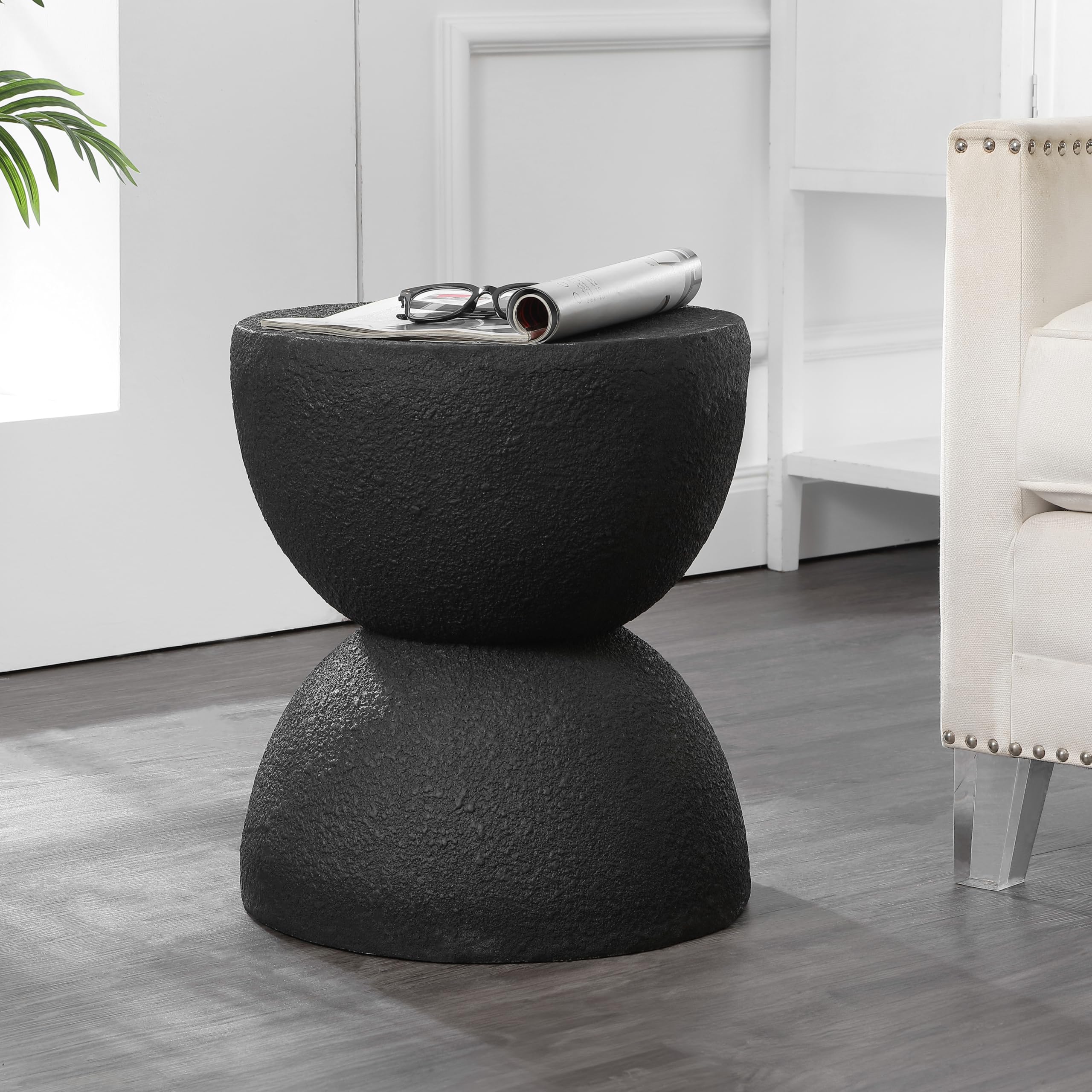 JONATHAN Y Greta front view showing sculptural hourglass silhouette and black frosted finish