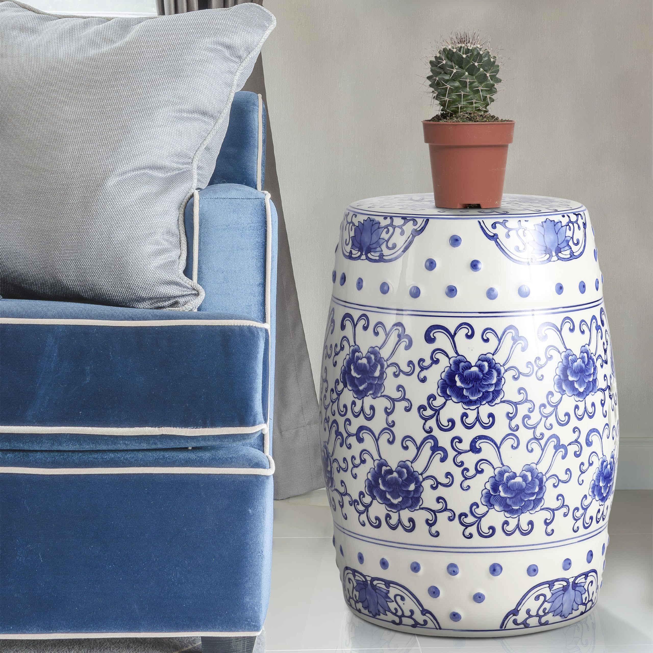 JONATHAN Y stool placed on patio surrounded by greenery offering garden elegance